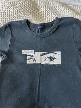 Brandy Melville Black Graphic Tee with White Eye Print